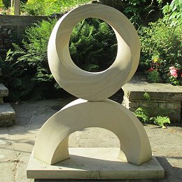 geometric stone Mobius sculpture with stand